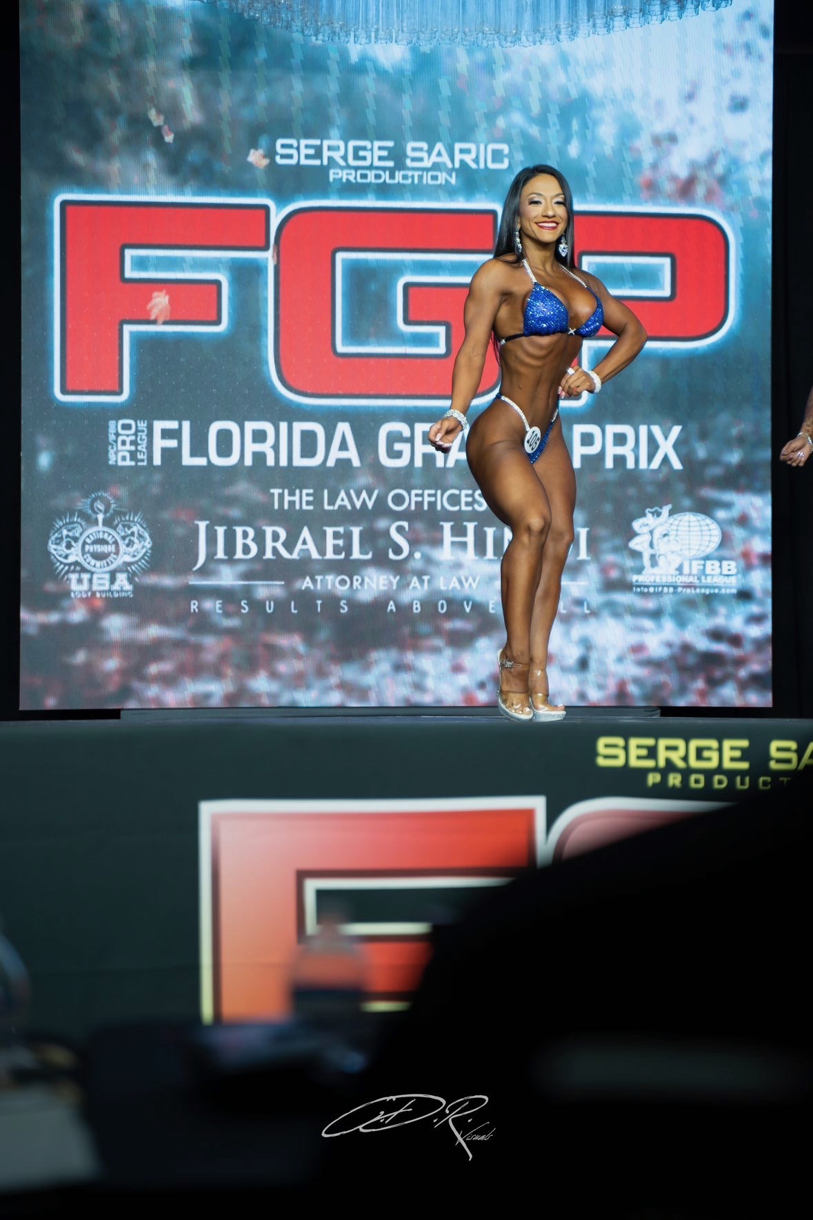 Abigail Marín competing on stage at the IFBB Florida Grand Prix.